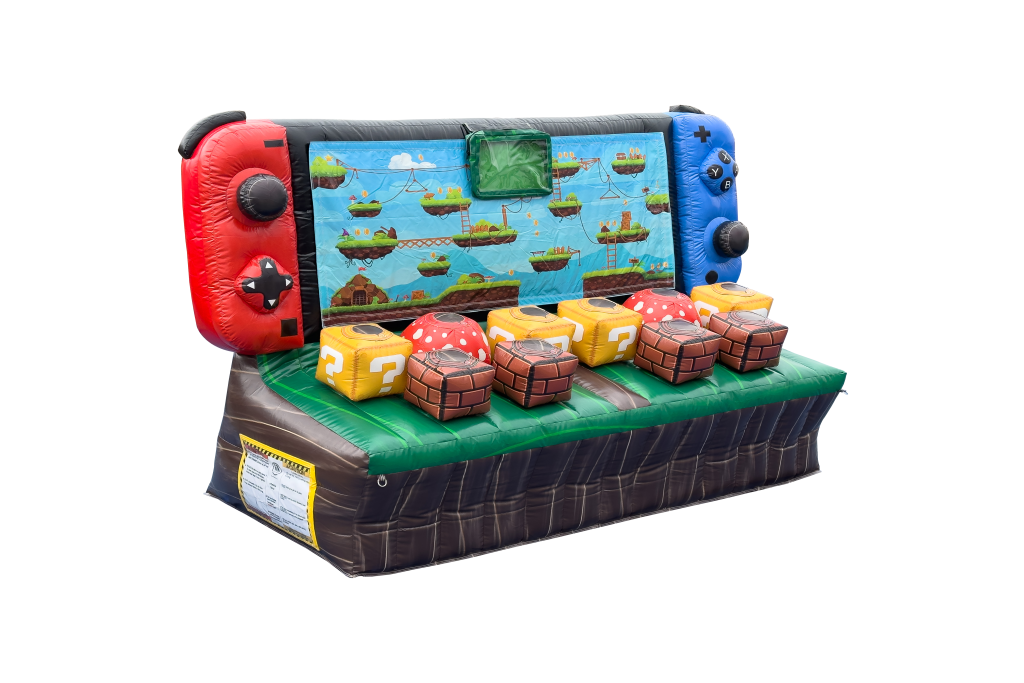 An inflatable game designed to look like a large video game console, featuring giant Light Speed Switch controller buttons and blocks resembling those from Super Mario, with a screen displaying a colorful platform game scene. - SuperGames